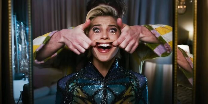 naomi scott forced to smile in smile 2 1200x600 1