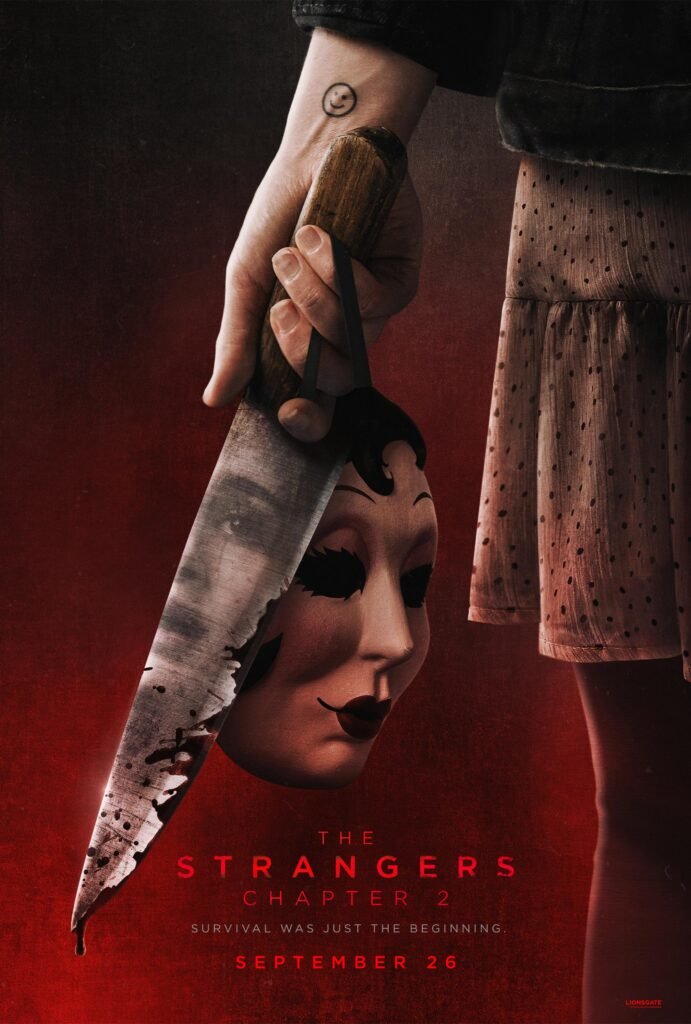 The Strangers Chapter 2 poster featuring a masked figure with a knife