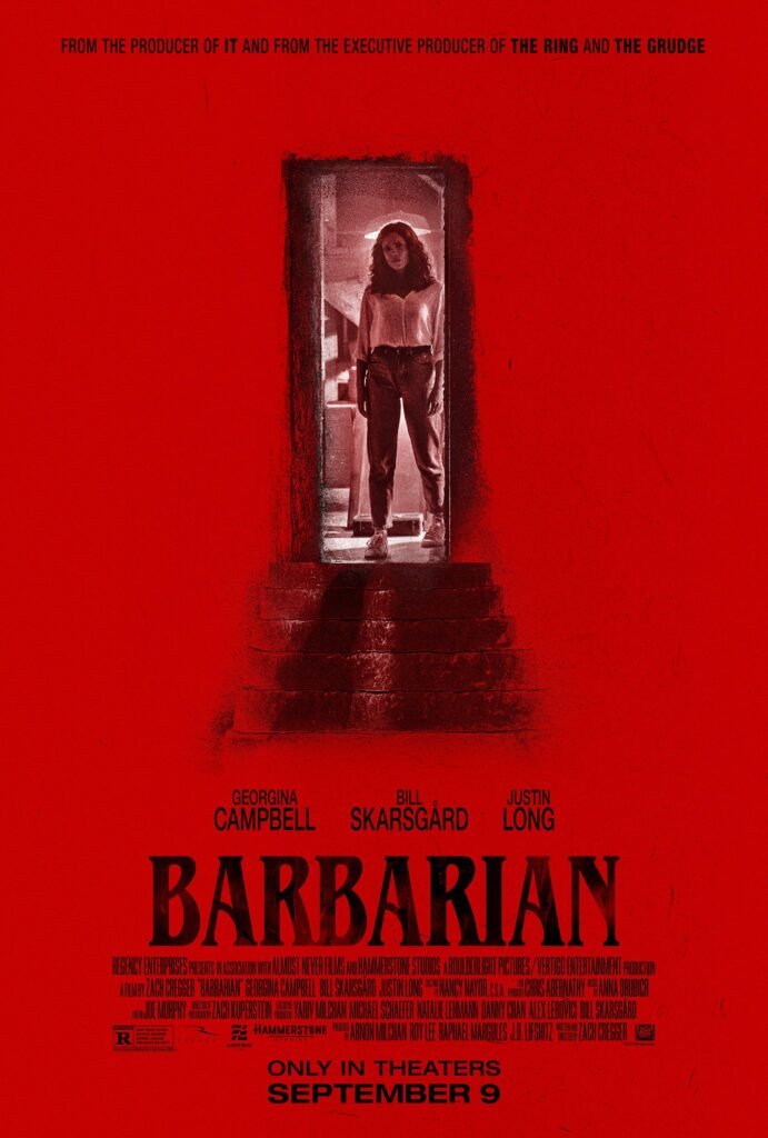 Barbarian poster showing a woman standing in a doorway