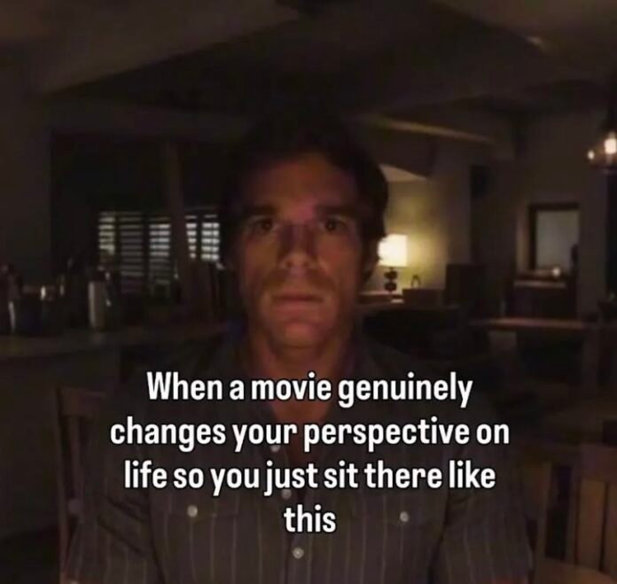 Moviegoer sitting silently after watching a film that genuinely changed their perspective on life
